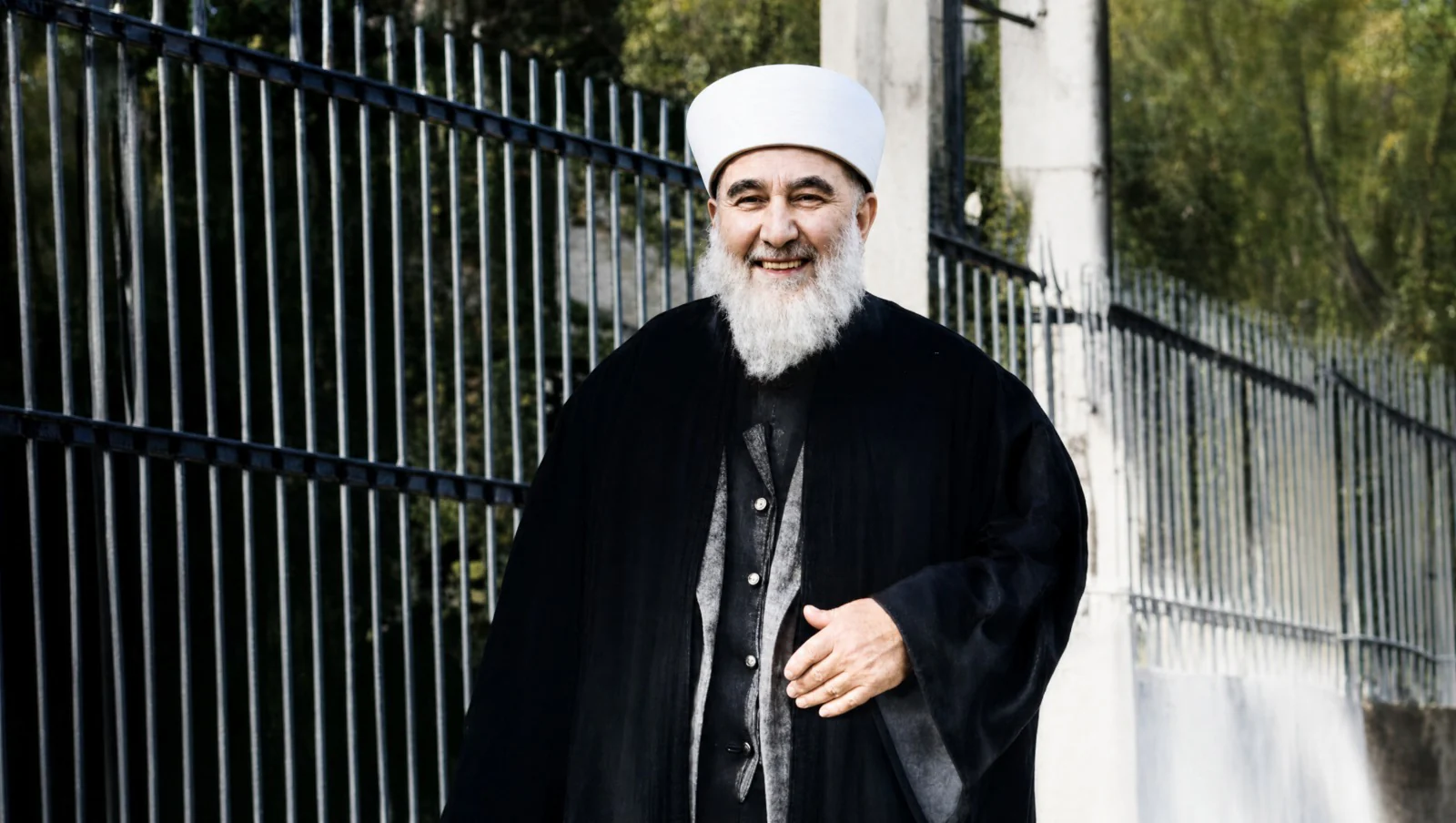 Mehmed Zahid Kotku standing outside
