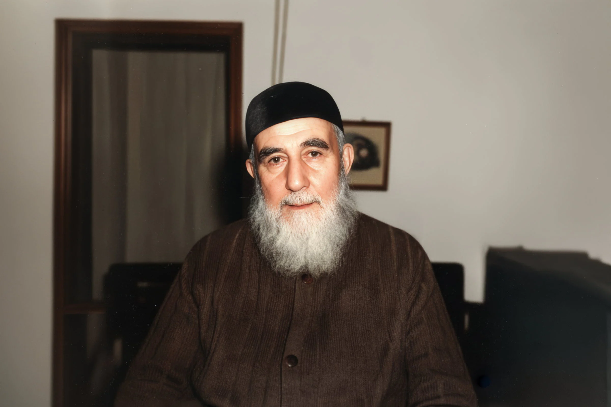 Mehmed Zahid Kotku seated in his room